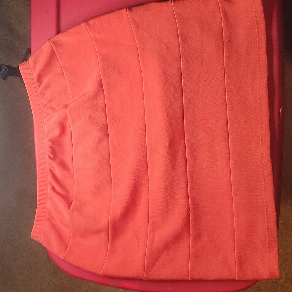 Coral color mid thigh skirt